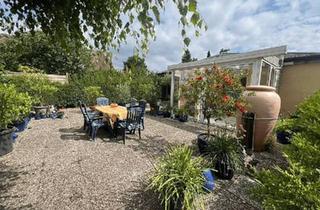 Einfamilienhaus kaufen in 24986 Mittelangeln, Mittelangeln - Strandnaher Bungalow als Kapitalanlage mit großem Grundstück