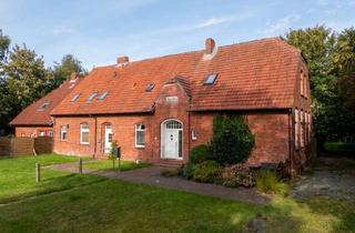 Wohnung kaufen in 26524 Hagermarsch, Wohnen am Feldrand – Historische Erdgeschosswohnung mit individuellem Gestaltungspotenzial in Hagerm