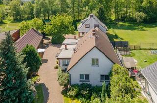 Einfamilienhaus kaufen in 03099 Kolkwitz, Einfamilienhaus, zwei Wohnungen und fantastisches Grundstück am Kanal in Kolkwitz OT Babow