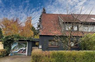 Doppelhaushälfte kaufen in 47495 Rheinberg, Gemütliche Doppelhaushälfte auf großem Grundstück in beliebter Wohngegend