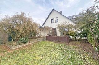 Haus kaufen in 35452 Heuchelheim, Ruhig gelegenes Haus mit Terrasse, Balkon und Garage