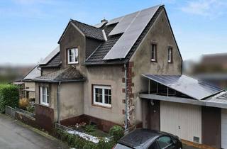 Einfamilienhaus kaufen in 33189 Schlangen, Einfamilienhaus in ruhiger Lage von Schlangen mit Garage