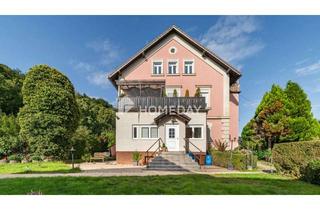 Wohnung kaufen in 93309 Kelheim, Lichtdurchflutete 2-Zimmer-Wohnung mit Wintergarten, Garage und Garten in Kelheim