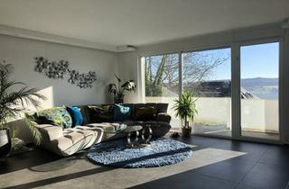 Doppelhaushälfte kaufen in 75177 Nordstadt, Modernisierte Split-Level-Doppelhaushälfte mit klarer Architektur