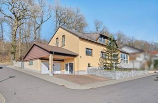 Einfamilienhaus kaufen in 63683 Ortenberg, Großzügiges Einfamilienhaus mit ELW in Waldrandlage!