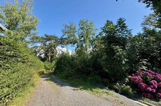 Immobilie kaufen in 35578 Wetzlar, Baugrundstück am Kirschenwäldchen – Hanglage, bewaldet, mit Baugenehmigung