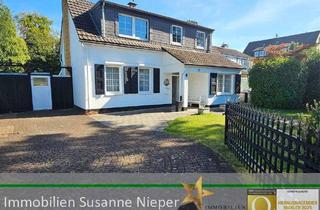 Einfamilienhaus kaufen in 42699 Solingen, Solingen - Charmantes, freistehendes Einfamilienhaus mit Wintergarten und Atelier in Solingen Aufderhöhe