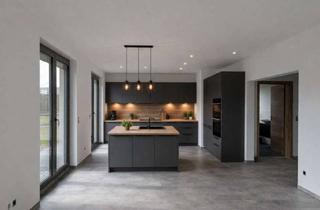 Wohnung kaufen in 38855 Wernigerode, Eigentumswohnung mit eigenem Garten-Erstbezug