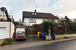 Haus kaufen in 51465 Bergisch Gladbach, Vielseitiges Wohnglück mit Einliegerwohnung und Traumgarten in Bergisch Gladbach