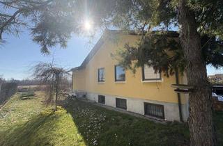 Haus kaufen in 84051 Essenbach, Sanierungsbedürftiger Bungalow mit Blick auf Wiesen und Felder