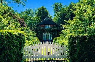Haus kaufen in 26937 Stadland, Landhaus mit Reetdach in Seefeld Zeitlose Eleganz auf parkähnlichem Grundstück