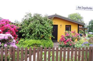 Haus kaufen in 23899 Gudow, … nur wenige Schritte zum See! Attraktives Ferienhaus mit gr. Süd-Terrasse und Carport