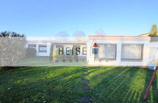 Haus kaufen in 37603 Holzminden, 1-Familien-Flachdachbungalow mit Garage