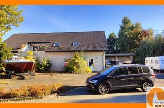 Haus kaufen in 33803 Steinhagen, Wohnen und Ihr Gewerbe: großzügiges EFH-ZFH mit beheizter Gewerbehalle