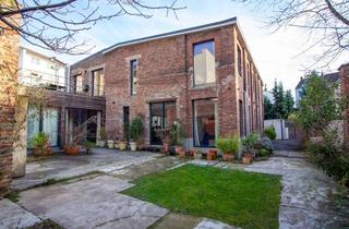 Loft kaufen in 40227 Oberbilk, Stillvolle Loft-Wohnung mit privatem Garten in diskreter Hinterhoflage