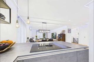 Wohnung kaufen in 63843 Niedernberg, Neuwertige 3-Zimmer Erdgeschoss-Maisonettewohnung in ruhiger Lage