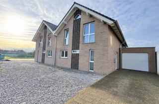 Anlageobjekt in 52538 Gangelt, Gangelt-Breberen: Wohnkomfort trifft Energieeffizienz – Stilvolle Doppelhaushälfte von 2015!