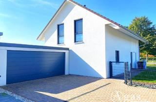 Einfamilienhaus kaufen in 04509 Löbnitz, Modernes Einfamilienhaus mit Garage und großem Garten in Seenähe