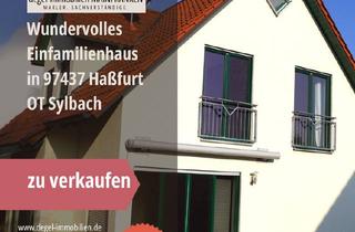 Einfamilienhaus kaufen in 97437 Haßfurt, Haßfurt - Mehr als ein Zuhause: Lichtdurchflutetes Wohnhaus mit Pool, Terrassen & Doppelgarage