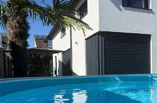 Einfamilienhaus kaufen in 76297 Stutensee, Stutensee - Freistehendes Architektenhaus mit Pool in Stutensee Friedrichstal