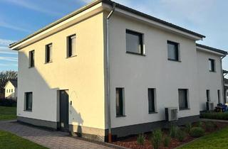 Doppelhaushälfte kaufen in 38473 Tiddische, Tiddische - Moderne Doppelhaushälfte im Neubaugebiet zu verkaufen