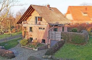 Haus kaufen in 31700 Heuerßen, Heuerßen - Exklusives Wohnambiente mit großzügigem Raumkonzept und hochwertiger Ausstattung!