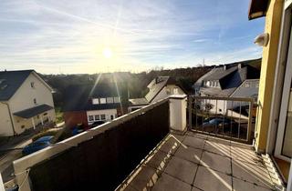 Wohnung kaufen in 65344 Eltville, Stilvolle 2-Zimmer-Dachgeschosswohnung mit zwei Balkonen und Garage in Eltville-Martinsthal