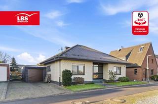 Haus kaufen in 47495 Rheinberg, Bungalow in Rheinnähe mit großem sonnigen Grundstück und Garage