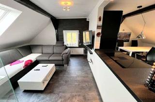 Wohnung kaufen in 25938 Wrixum, Modernisierte und top-gepflegte DG-Wohnung mit Mühlenblick