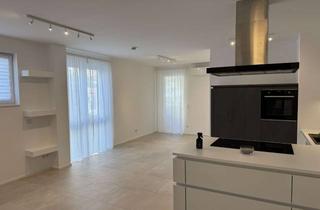 Wohnung kaufen in Rheinstraße 43, 65462 Ginsheim-Gustavsburg, Barrierefreie Neubau-Erdgeschosswohnung 4 Zimmern und Stellplatz