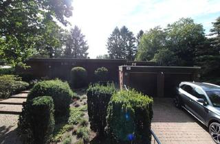 Einfamilienhaus kaufen in 27619 Schiffdorf, Individueller Flachdach-Bungalow mit Doppelgarage & Parkähnlichem Grundstück in Schiffdorf-Sellstedt