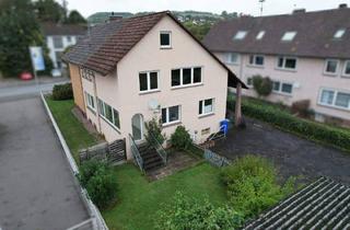 Einfamilienhaus kaufen in 37688 Beverungen, Beverungen - Massives Einfamilienhaus mit Garten und Garagen in Beverungen