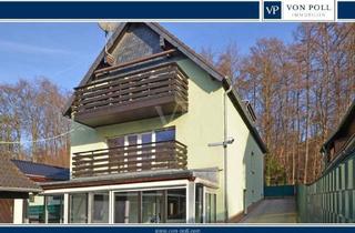 Einfamilienhaus kaufen in 40764 Langenfeld, Langenfeld - Zweifamilienhaus mit Einliegerwohnung - großer Garten und 3 Garagen