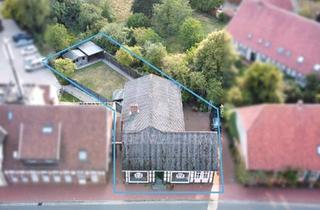 Haus kaufen in 49637 Menslage, Menslage - Wohnhaus (2WE+ Geschäft) in Menslage (Landkreis Osnabrück)