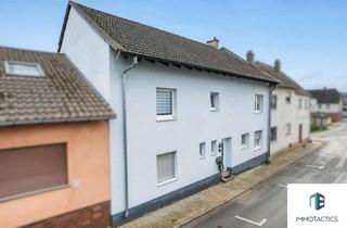 Haus kaufen in 55595 Allenfeld, Allenfeld - Vermietetes Zweifamilienhaus mit separaten Zugängen, Garten, Balkon & Ausbaureserve in Ortsrandlage