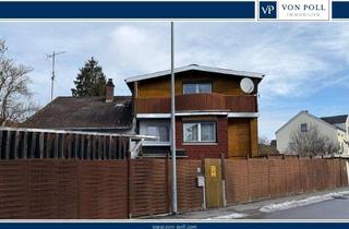 Reihenhaus kaufen in 84140 Gangkofen, Ein besonderes Reihenhaus mit Garten und großer Garage.