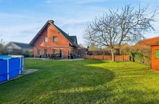 Einfamilienhaus kaufen in 48268 Greven, Ankommen und Wohlfühlen: Lichtdurchflutetes Einfamilienhaus mit Gartenparadies in Greven-Reckenfeld