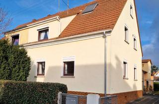 Doppelhaushälfte kaufen in 60437 Nieder-Erlenbach, Charmante modernisierte Doppelhaushälfte mit Gartengrundstück und Garage