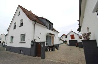 Haus kaufen in 64584 Biebesheim, Saniertes Zweifamilienhaus mit vielseitigen Nutzungsmöglichkeiten