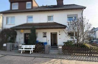 Doppelhaushälfte kaufen in 65760 Eschborn, Attraktive Doppelhaushälfte mit Garage und schönem Garten in Eschborn-Niederhöchstädt!