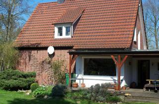 Einfamilienhaus kaufen in 26789 Leer, Romantisches Einfamilienhaus mit großem Garten und Baureserve in Logabirum