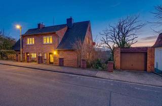 Haus kaufen in 24837 Schleswig, Wohnen mit Weitblick: DHH mit 153qm Wfl/Nfl., großem Garten, Balkon, Terrasse & direkter Schlossnähe