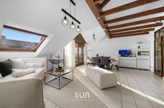 Wohnung kaufen in 65428 Rüsselsheim, STILVOLL, MODERN UND PRIVAT – Lichtdurchflutete Dachgeschosswohnung mit Flair