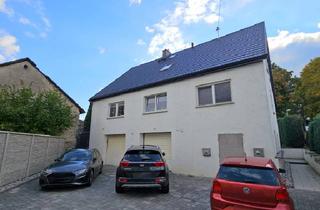 Wohnung kaufen in 56424 Mogendorf, 3-Zimmer Eigentumswohnung mit Garage, Stellplatz und eigenem Garten