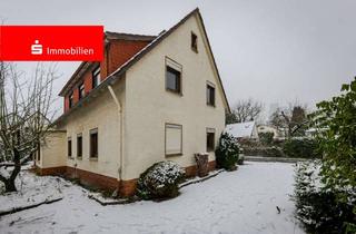 Einfamilienhaus kaufen in 65824 Schwalbach, Schwalbach am Taunus: Sanierungsbedürftiges Einfamilienhaus mit großem Grundstück und Entwicklung