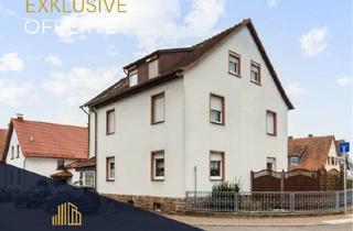 Mehrfamilienhaus kaufen in 61381 Friedrichsdorf, Solides Mehrfamilienhaus mit drei Wohneinheiten, Garagen, Garten und Entwicklungspotenzial.