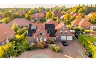 Einfamilienhaus kaufen in 26529 Upgant-Schott, Großzügiges Einfamilienhaus mit ELW und pflegeleichtem Grundstück