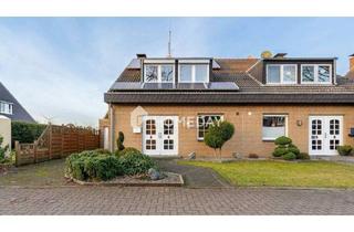 Haus kaufen in 46286 Dorsten, Dorsten Rhade - Einziehen & wohlfühlen: Modernisierte DHH mit Garten und Kamin