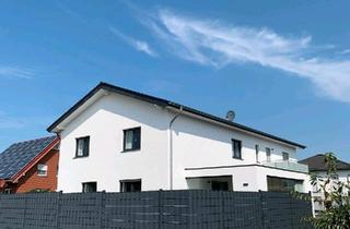 Doppelhaushälfte kaufen in 32361 Preußisch Oldendorf, Preußisch Oldendorf - Moderne Doppelhaushälfte mit Terrasse & Wärmepumpe in Preußisch