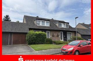 Doppelhaushälfte kaufen in 47802 Krefeld, Krefeld - Vermietete Doppelhaushälfte mit Garage
